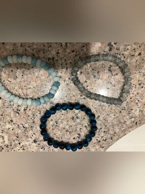 3 blue beaded bracelets